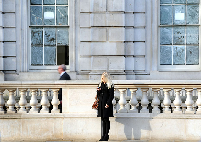 Week in Business: People walking in Whitehall, London
