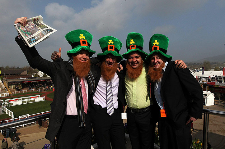 St Patricks Day: A group of racegoers dress as Leprechauns to celebrate St Patrick's Day