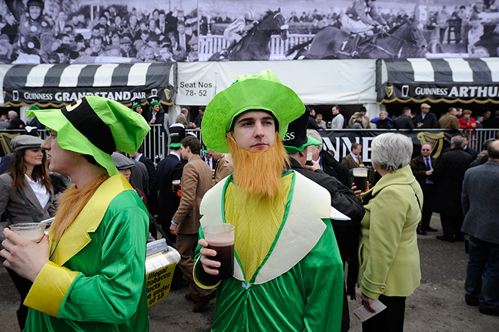 St Patricks Day: Irish revellers have a drink on St Patricks Day at Cheltenham