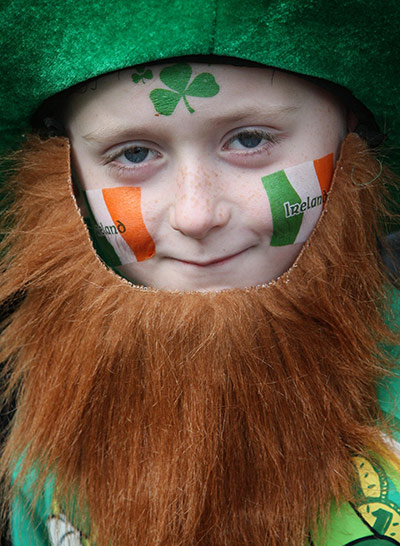 St Patricks Day: Lee Mooney watches the annual St Patrick's Day parade in Belfast