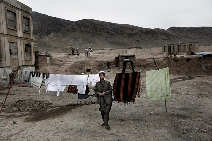 24 Hours In Pictures: Afghan boy