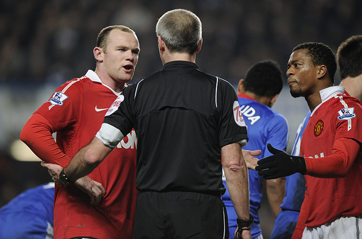 Chelsea v Man Utd: Wayne Rooney and Patrice Evra complain to the referee