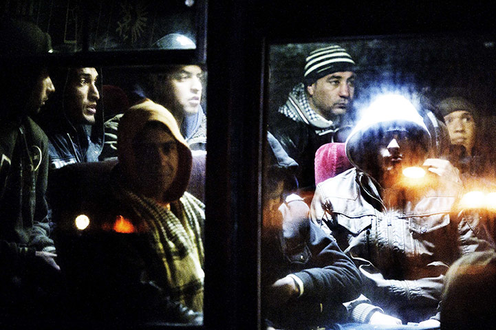 24 hours in pictures: immigrants on Lampedusa Island, Italy