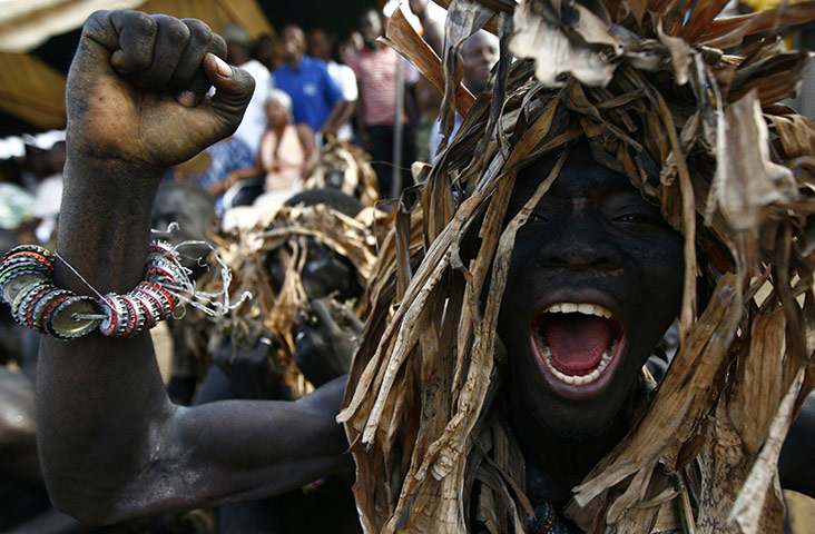 24 hours: Yopougon, Ivory Coast: A supporter of Laurent Gbagbo takes part in a rally 