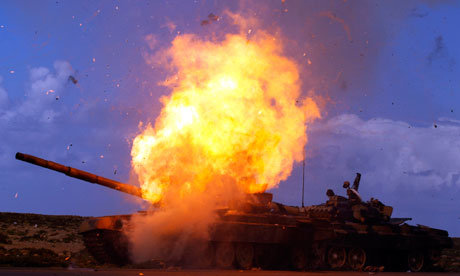 A tank belonging to forces loyal to Libyan leader Muammar Gaddafi explodes