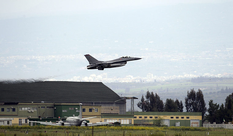 Libya airstrikes: A Danish F-16 aircraft takes off from the Nato airbase in Sigonella, Sicily