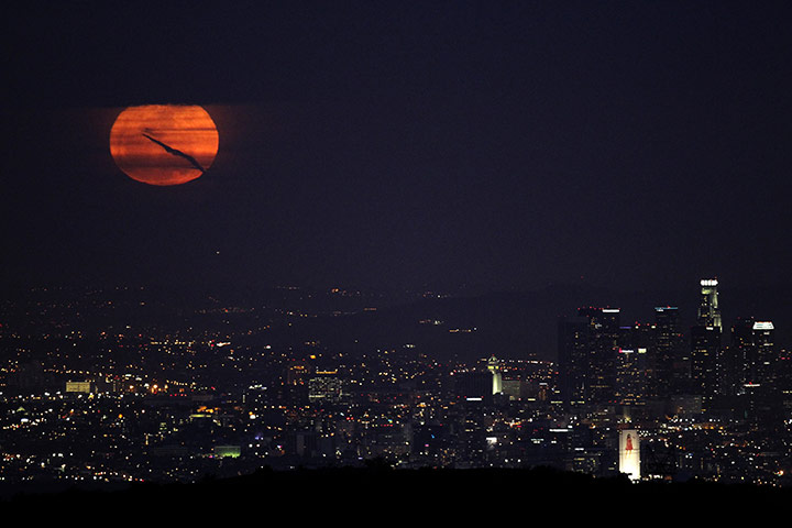 Super moon: The moon rises over downtown Los Angeles, California 