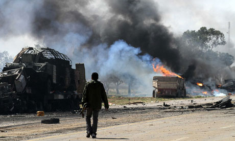 Gaddafi's forces suffer coalition attacks