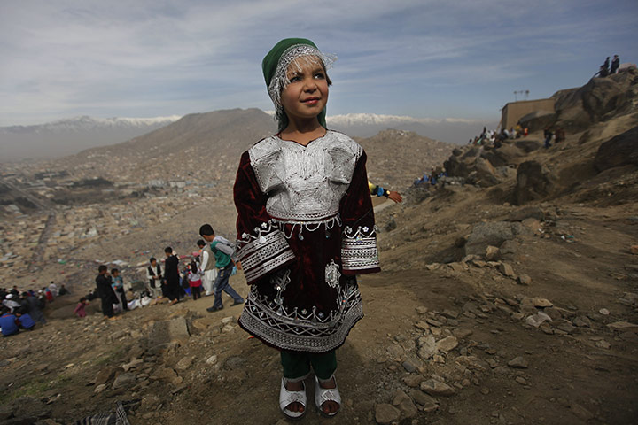 Spring festivals: An Afghan girl poses for a photograph