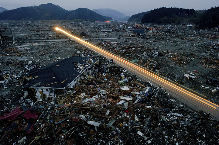 Japan salvage: Destroyed houses and debris in the tsunami-damaged city of Rikuzentakata