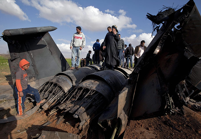 Sean Smith In Libya: 22 March: Libyans inspect the wreckage of a US F-15E Strike Eagle fighter