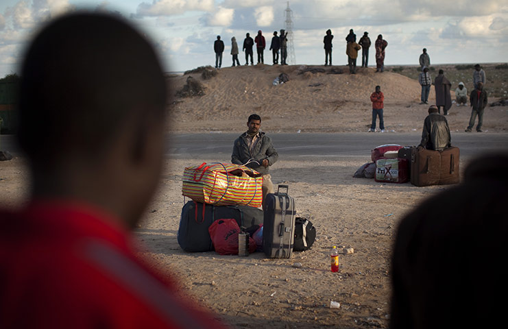 24 hours: Foreign workers fleeing the civil war in Libya wait to be repatriated