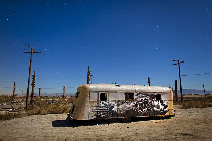 FTA: Jim Lo Scalzo: An abandoned trailer is lit by a full moon