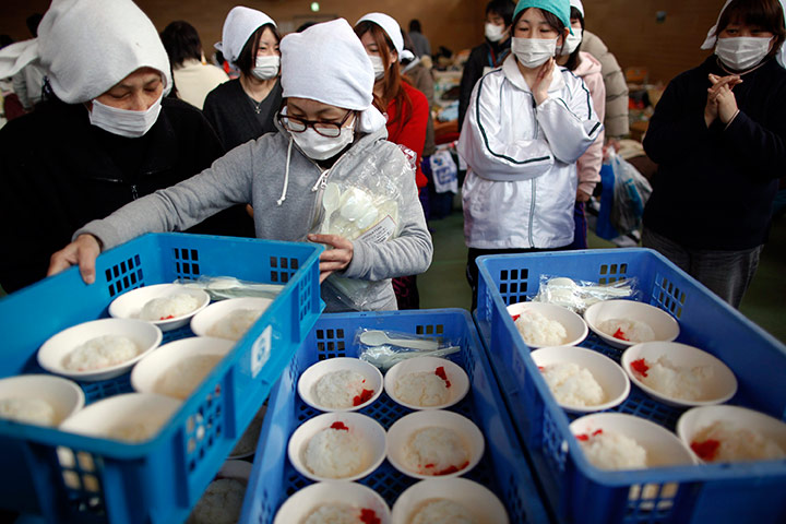 Japan survivors: Food to be distributed to victims at a shelter in Rikuzentakata
