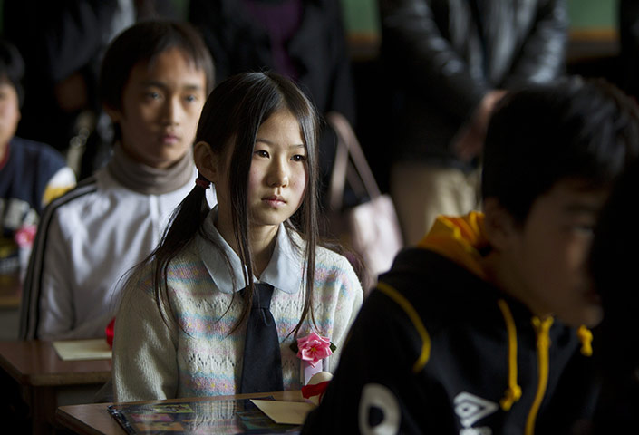 Japan survivors: A graduation ceremony at Elementary school in Kesennuma