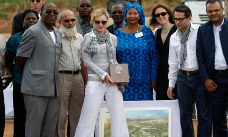 Madonna laying the first stone of Raising Malawi Girls Academy