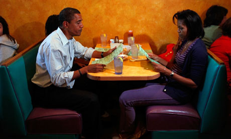 The Obama family in a restaurant