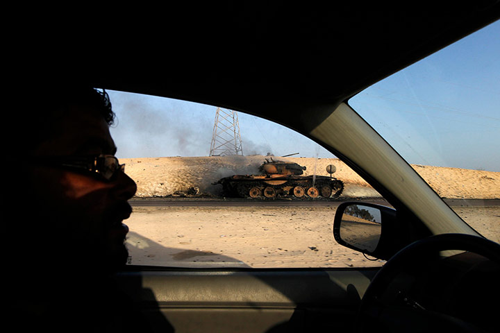 libya today: A burnt tank  on the road to Sirte 