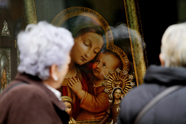 Graeme Robertson in Spain: A painting of the Madonna and child in a shop