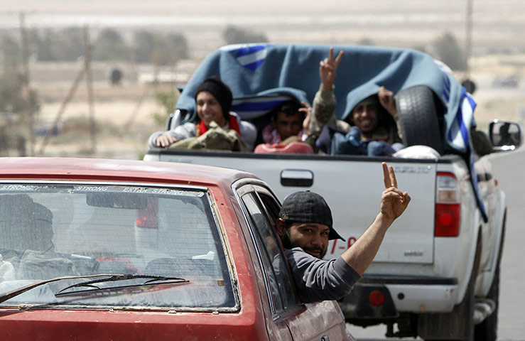 Conflict in Libya: Rebels leave the rebel held port of Brega for the front line 