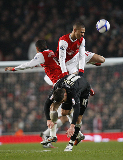 Wednesday FA Cup: Arsenal's Denilson and Kieran Gibbs go up for a header