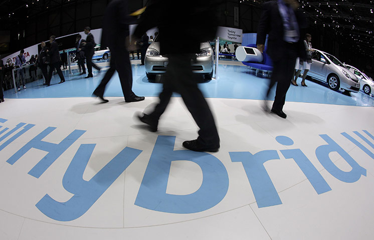 the book bus: Visitors walk on a sign reading 