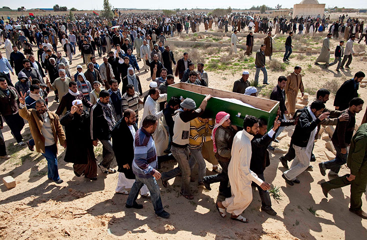 Libya Gallery: Libyans carry the coffin of a rebel killed in fighting with troops