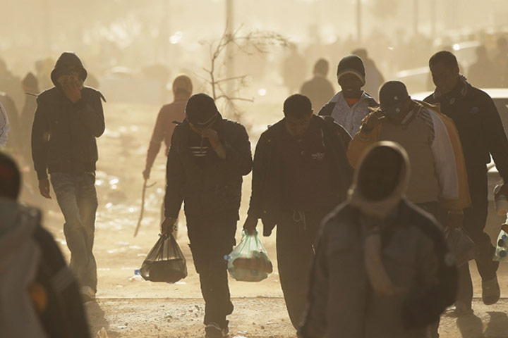 migrant workers flee : Migrant workers are living