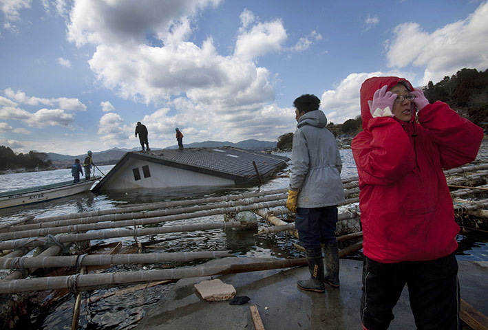 From the agencies: attempt to pull house ashore on Oshima island