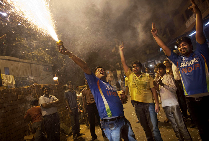 24 hours in pictures: Indian cricket fans celebrate beating Pakistan