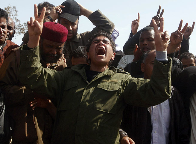 Libya unrest continues: A mourner cries during the funeral 