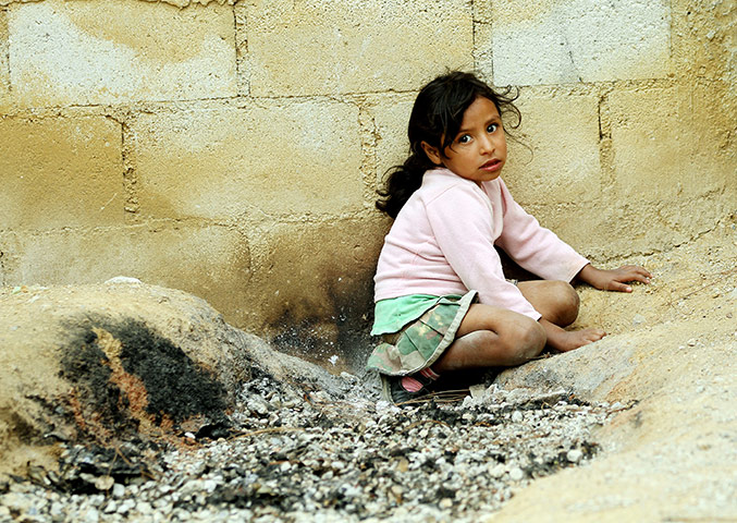 Guatemala Toybox Charity: A child plays in the street