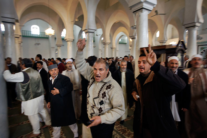 Libya protests: protesters give the victory sign