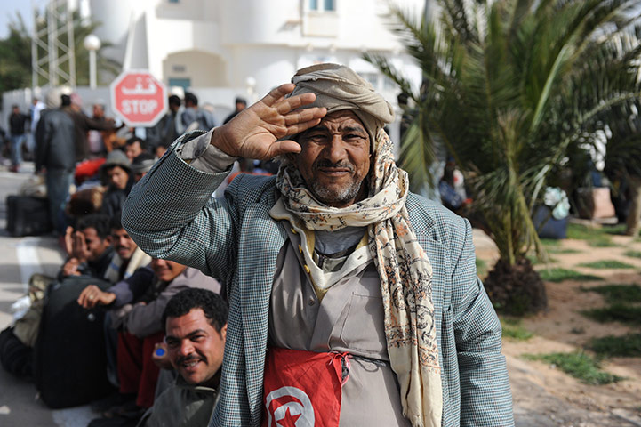 libya unrest continues: A Egyptian  who fled unrest in Libya ges