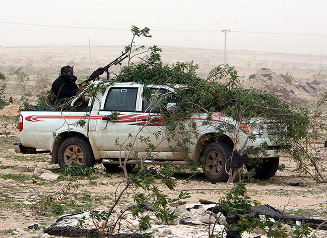 libya unrest continues: Libyan anti-government forces in in Brega