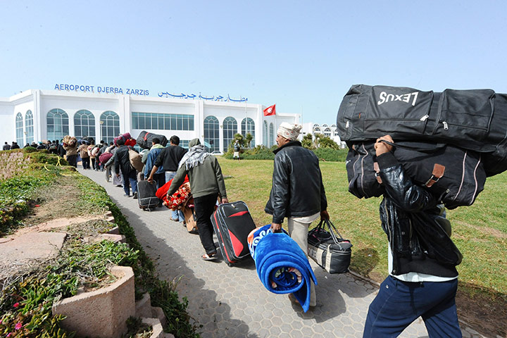 Libya unrest continues: Refugees evacuated from Lybia arrive in Djerba, Tunisia