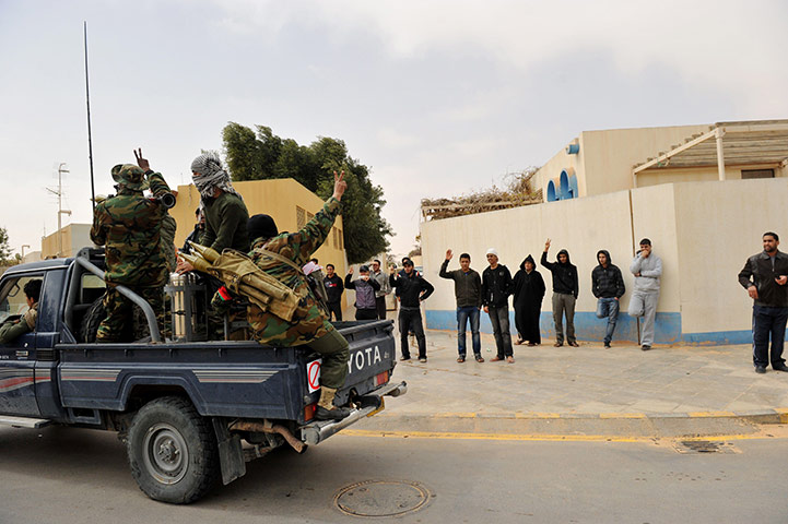 Libyan Unrest: Residents wave