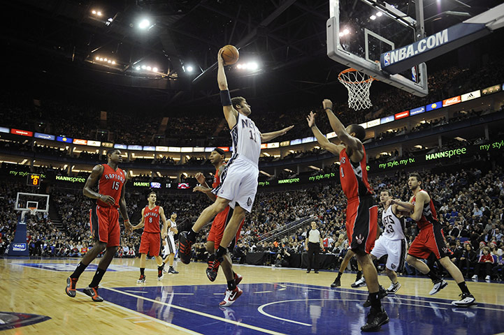 NBA: Brook Lopez of New Jersey flies in to slam-dunk 