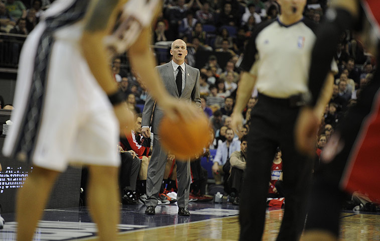 NBA: Raptor head coach Jay Triano watches as his team defends