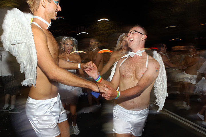 Sydney Mardi Gras: Parade-goers dance during the 2011 Sydney Gay & Lesbian Mardi Gras Parade 