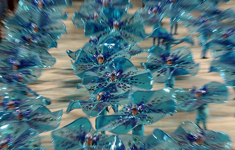 Rio carnival: The Samba Sao Clemente group perform in a parade at the Sambadrome