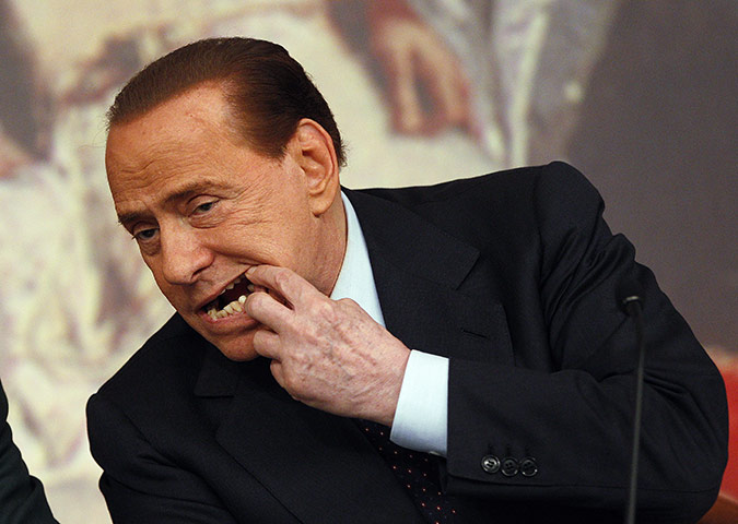 Berlusconi Surgery: Silvio Berlusconi shows his teeth 2011