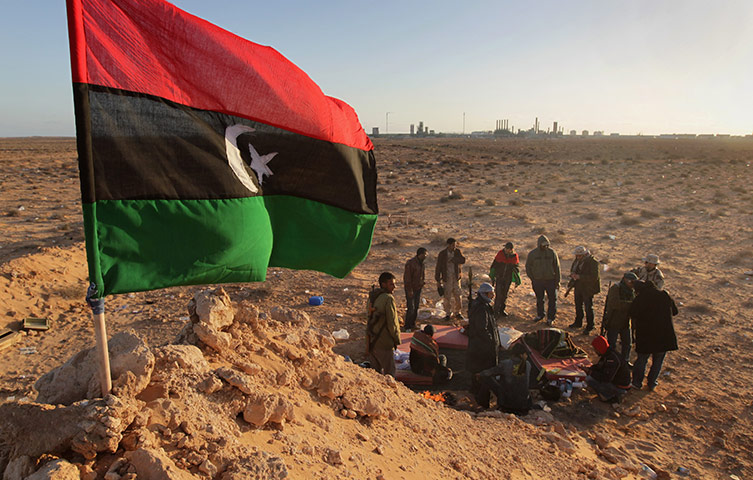 Libya battles continue: Opposition Rebels Battle Gaddafi Forces In Eastern Libya
