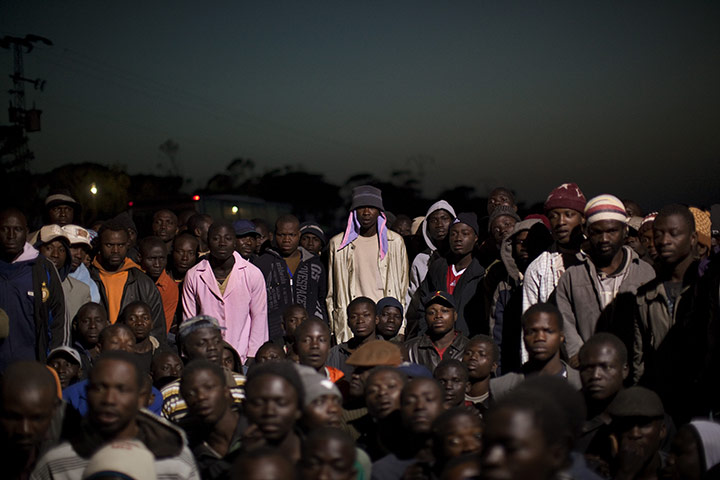 Libya battles continue: Men from Ghana at a refugee camp at the Tunisia-Libyan border,