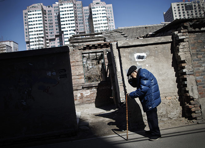 24 hours in pictures: a partially demolished house on a hutong