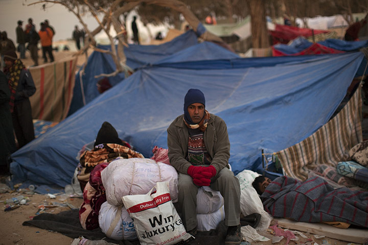 Libya Ras Jdir: A man from Bangladesh waits for information regarding his repatriation 