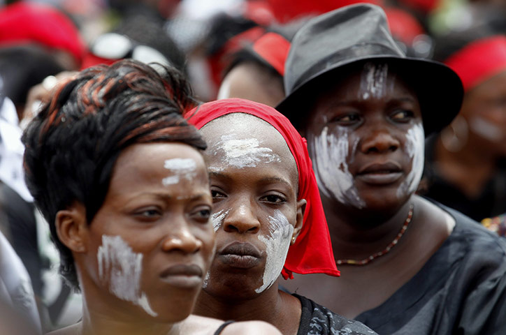 Ivory Coast violence: Anti-Gbagbo protesters look on during a demonstration in Abidjan