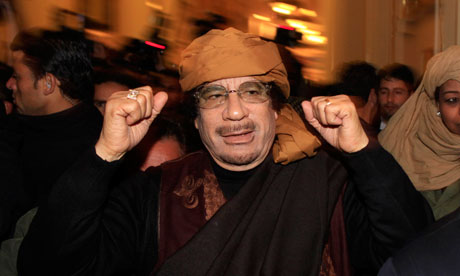 Libya's leader Muammar Gaddafi arrives to give television interviews at a hotel in Tripoli, Libya