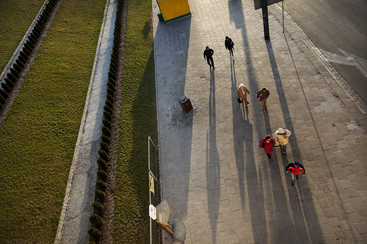 David Levene in Poland: Commuters near to the Old Town, Warsaw