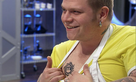 Masterchef contestant James Perry displays his tattoo Photograph PA